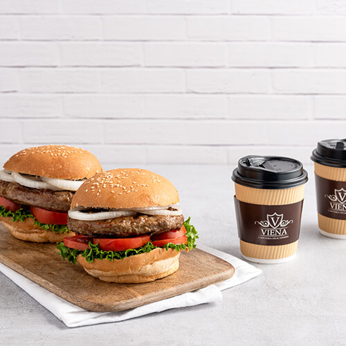 2 HAMBURGUESAS DE LA CASA + 2 CAFÉS AMERICANOS 8 OZ